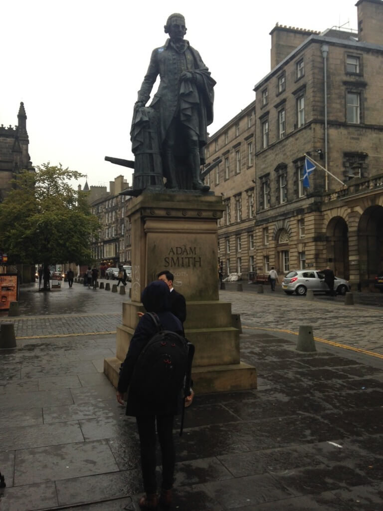 Adam Smith sports a 'Yes' sticker by Parliament Square, Edinburgh, on Wednesday morning.